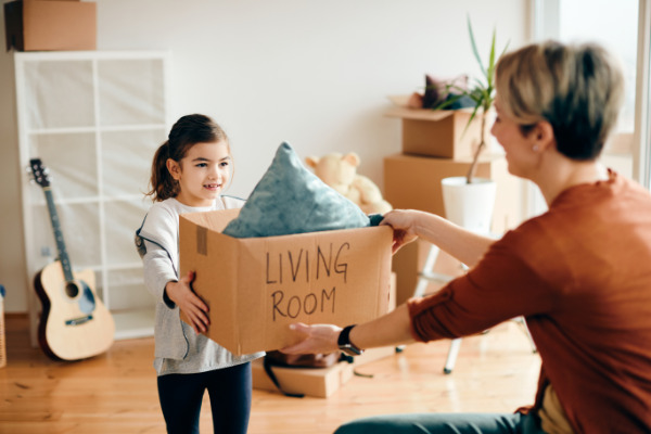 girl and mother unpacking