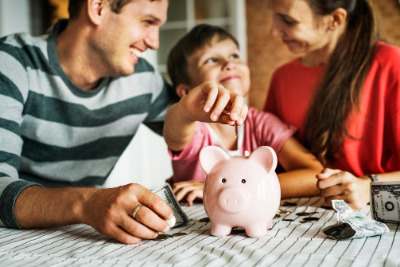 family with piggy bank