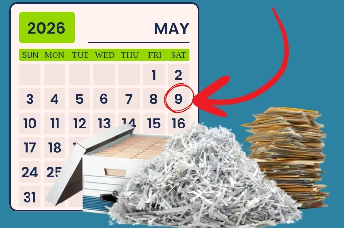 May 2026 calendar next to pile of shredded documents