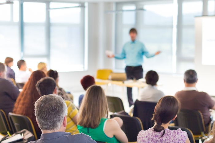 informal meeting with speaker facing the audience