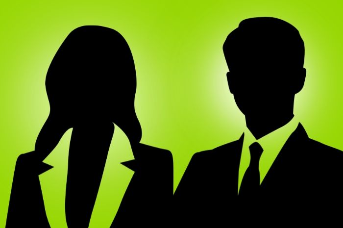 silhouette of female and male business people