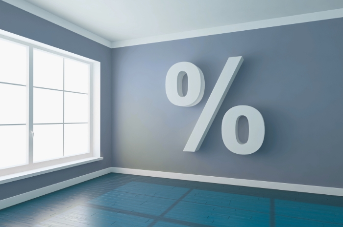 interior of home with large % sign on the wall