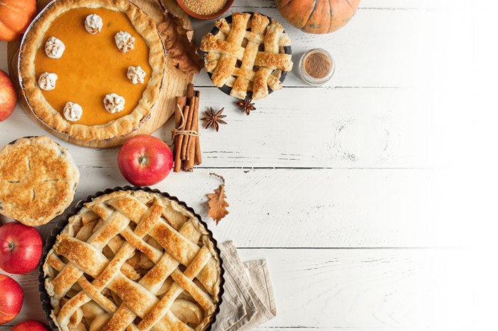 holiday pies and Fall decorations on a table