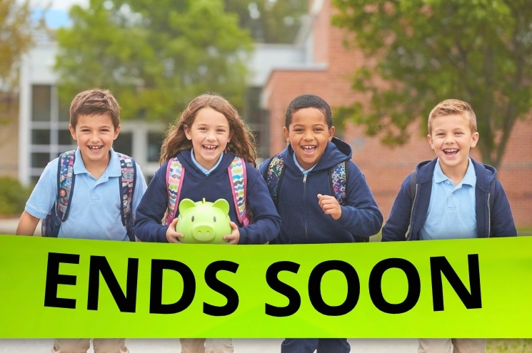 children racing toward finish line carrying piggy bank