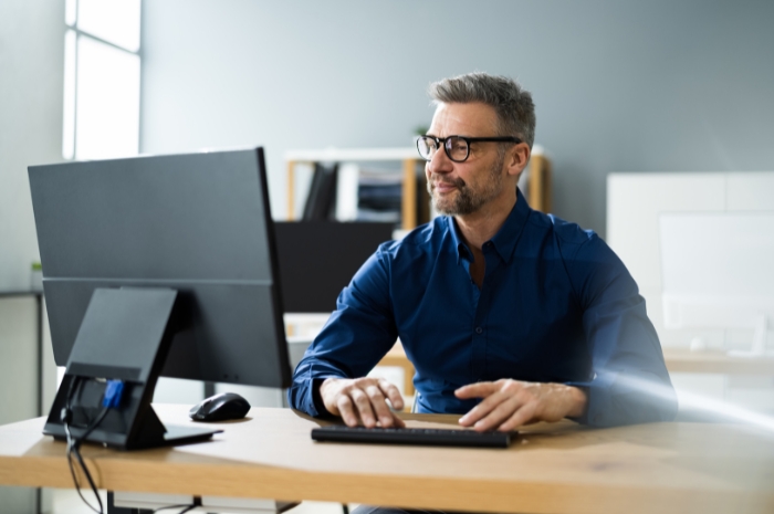 man at computer