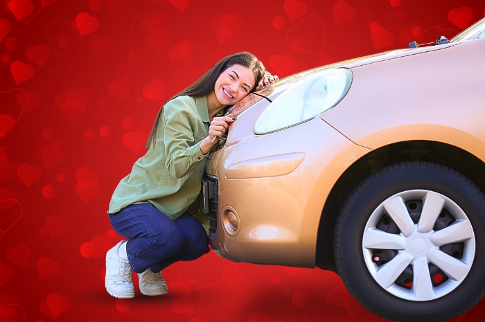 woman hugs the front of a car with red hearts floating in background