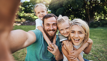 happy family taking selfie