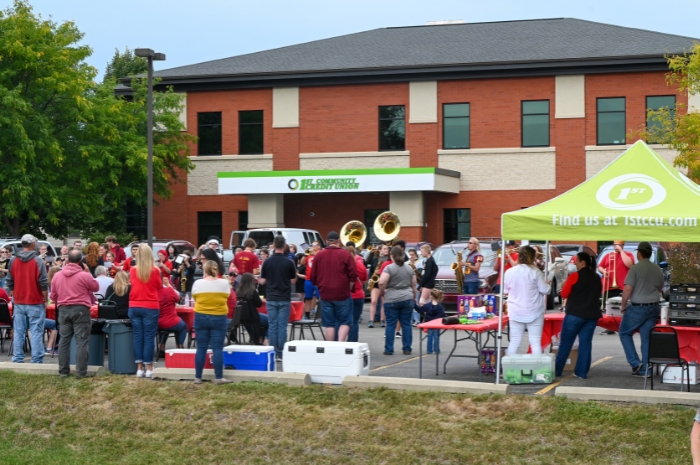 a group of members enjoying a tailgate celebration at a credit union